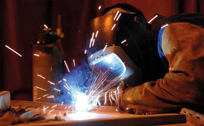 Welding a stainless steel component in the fabrication workshop