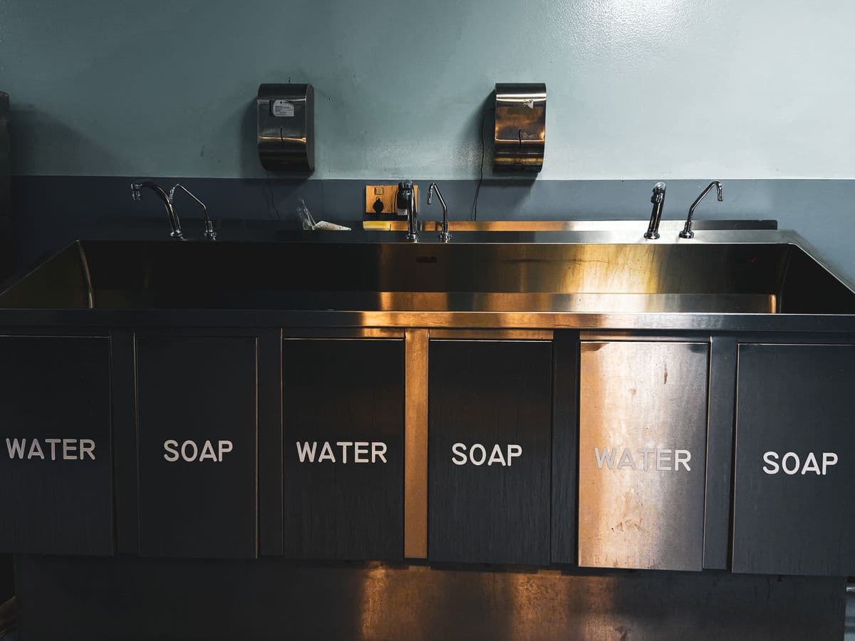 Stainless steel washing station in a commercial kitchen