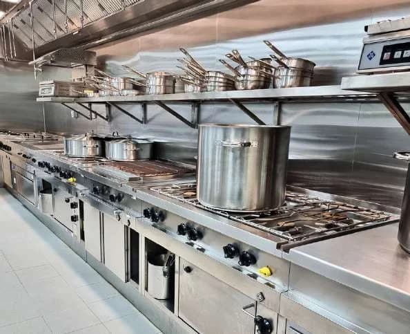 Commercial kitchen with large stockpots