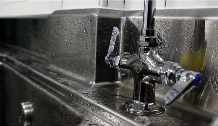 Stainless steel sink and tap
